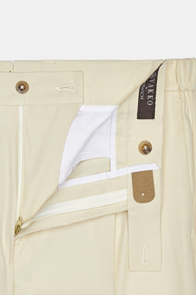 CREAM TROUSERS 9
