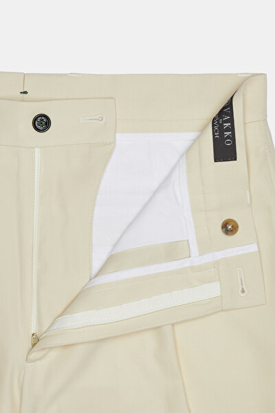 CREAM TROUSERS 8