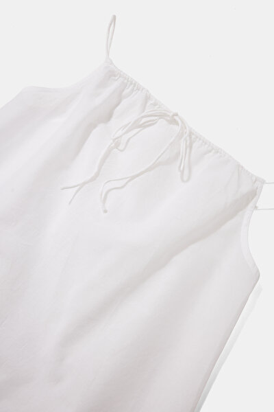 WHITE SLEEVELESS SUSPENDER BLOUSE 3