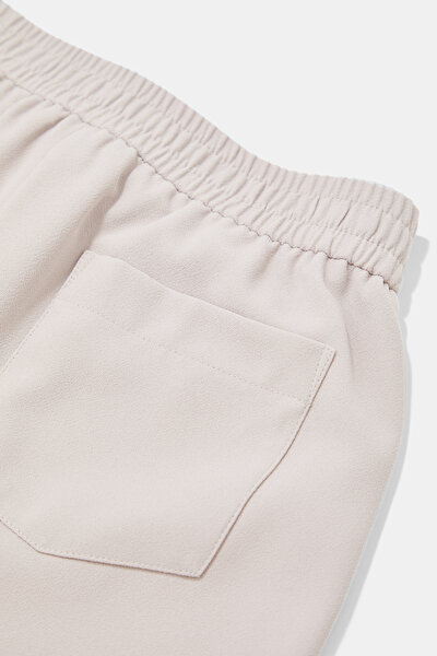 BEIGE SKINNY LEG TROUSERS 4