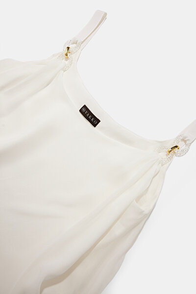 ECRU CLEAVAGE SLEEVELESS SUSPENDER BLOUSE 10