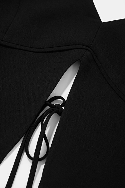 BLACK PLUNGE NECKLINE SLEEVELESS SUSPENDER BLOUSE 4