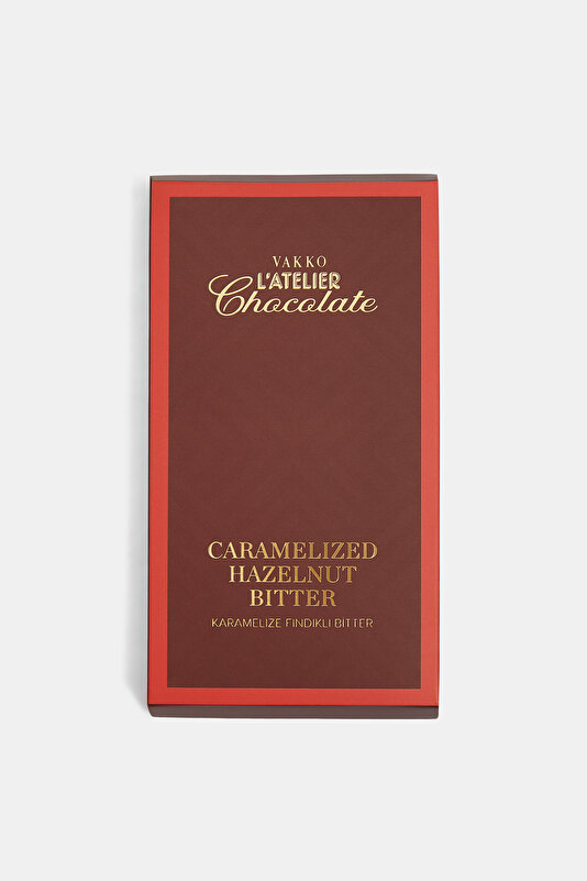 CARAMELIZED MILK CHOCOLATE COATED HAZELNUT BITTER IN TABLET FORM
