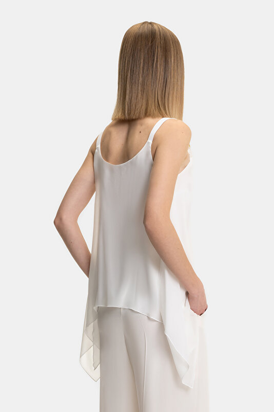 ECRU CLEAVAGE SLEEVELESS SUSPENDER BLOUSE 2