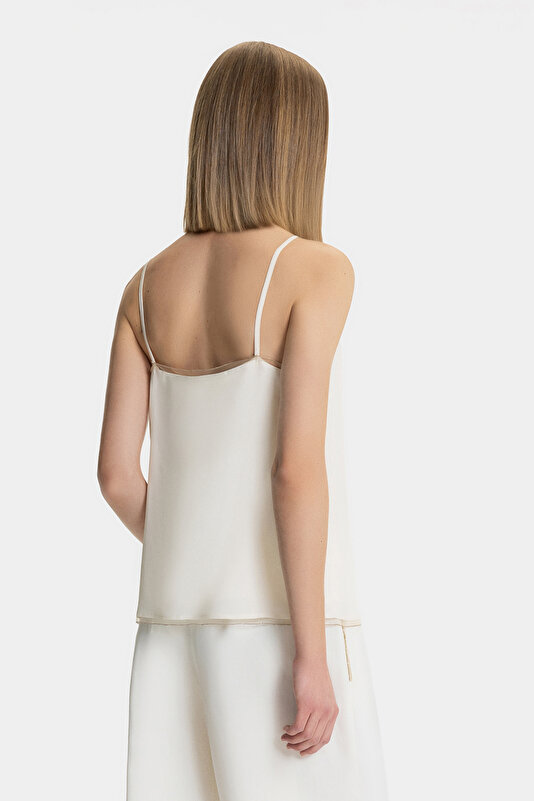ECRU PLUNGE NECKLINE SLEEVELESS SUSPENDER BLOUSE 2