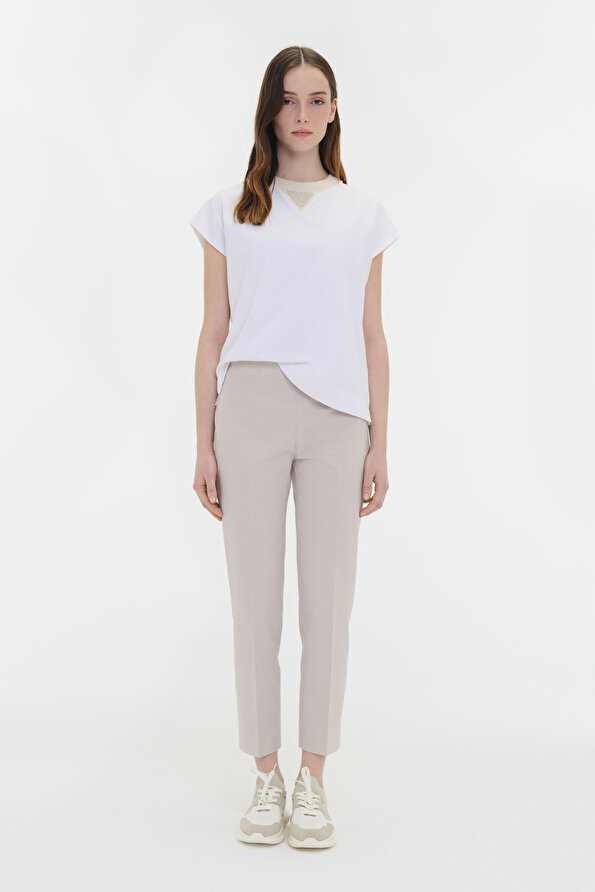 BEIGE SKINNY LEG TROUSERS