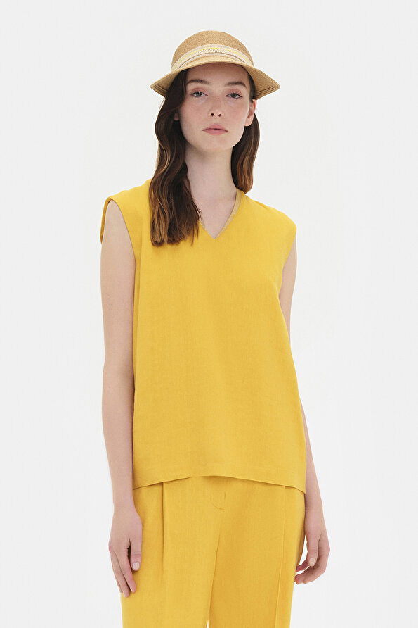 YELLOW V NECK SLEEVELESS BLOUSE