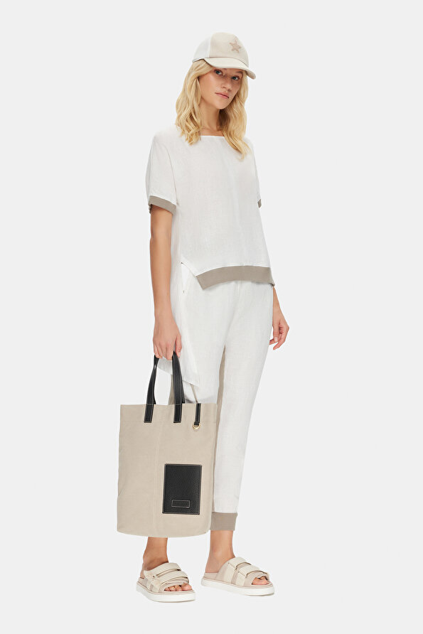 BEIGE SKINNY LEG TROUSERS