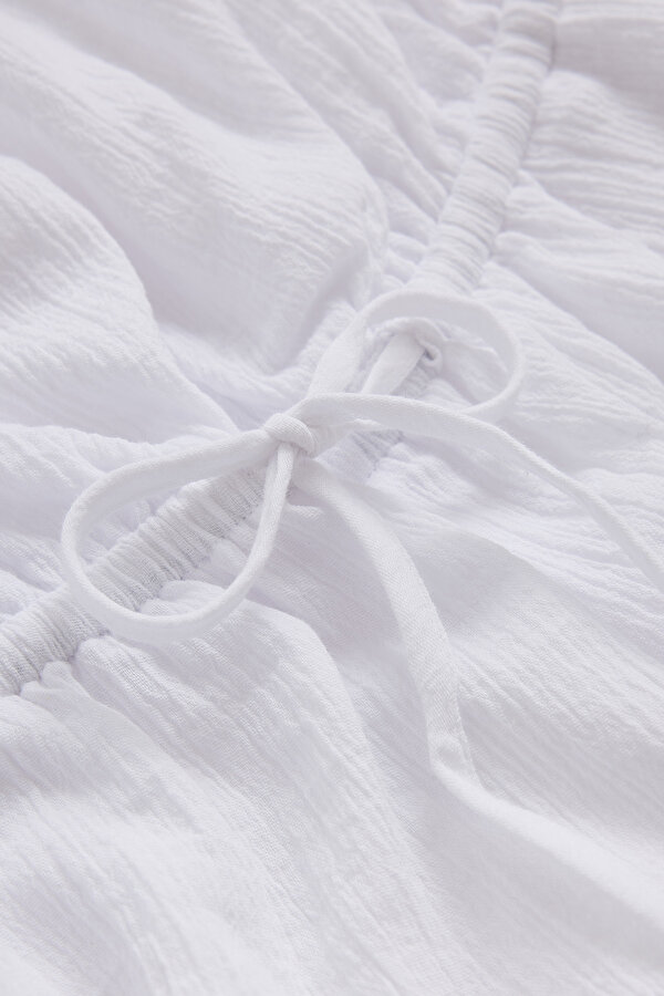WHITE JUMPSUIT 2