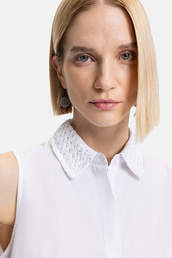 WHITE SLEEVELESS SHIRT 6