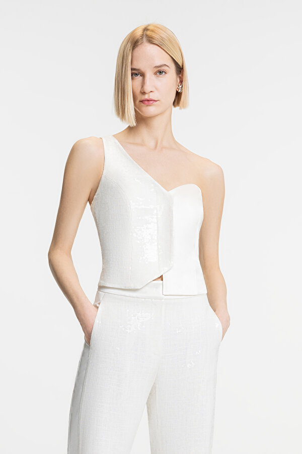 ECRU ASYMMETRIC SLEEVELESS BLOUSE