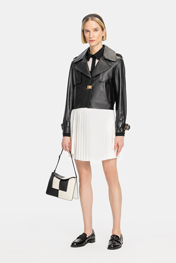 ECRU PLEATED ABOVE THE KNEE SKIRT