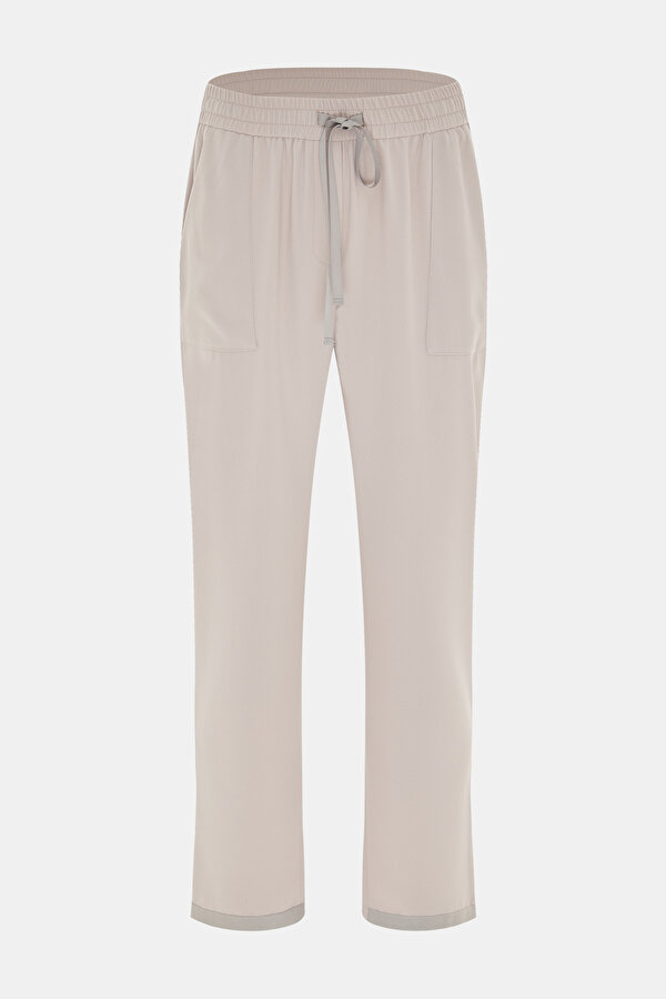 BEIGE SKINNY LEG TROUSERS