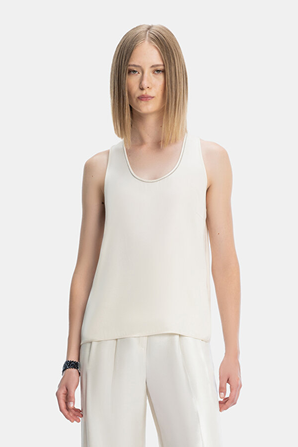 ECRU CLEAVAGE SLEEVELESS BLOUSE