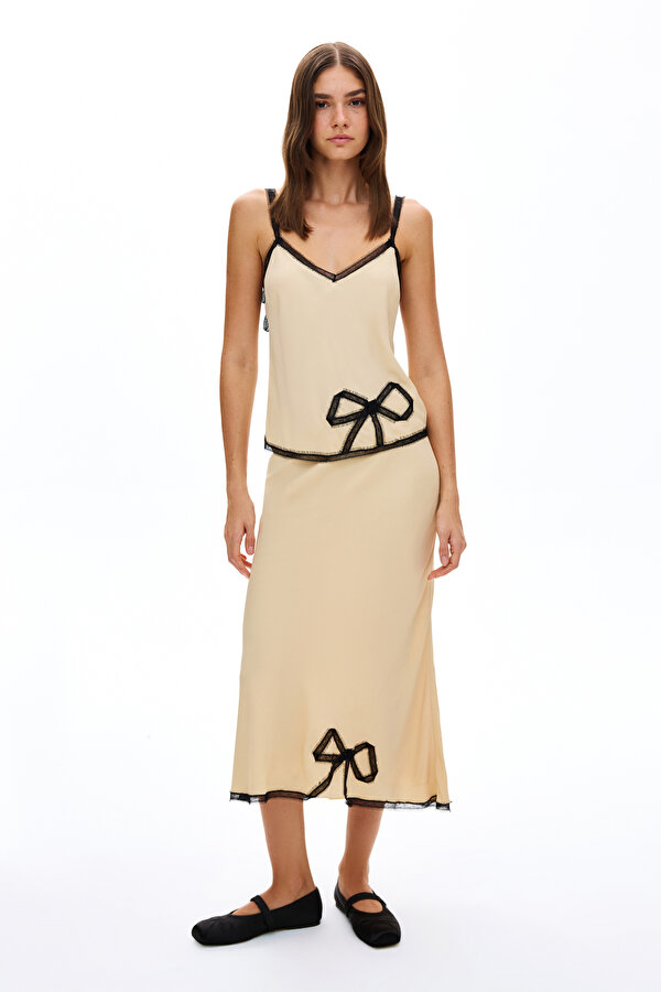 CREAM SLEEVELESS SUSPENDER BLOUSE